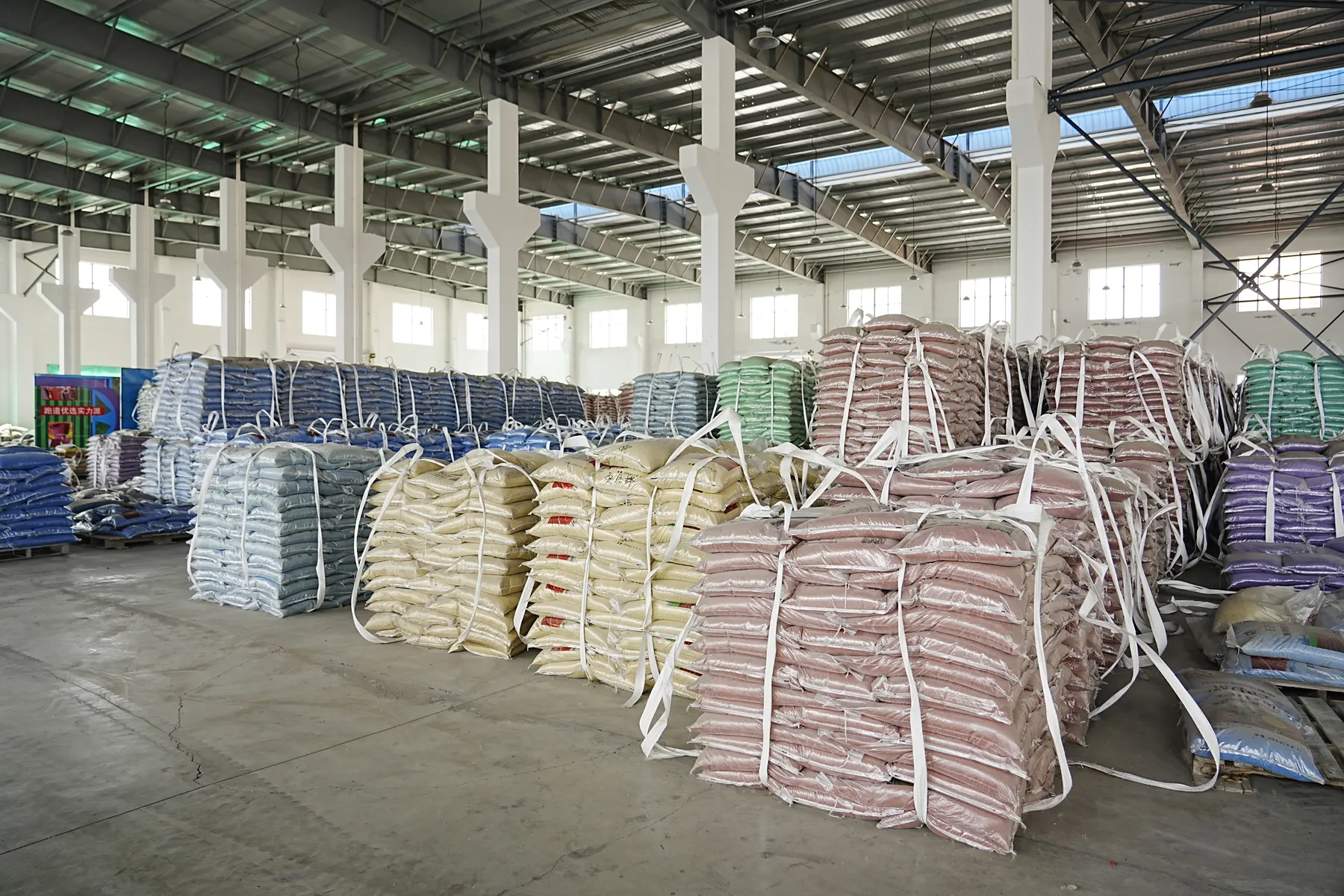 Palletised bagged finished materials in the Chuangte warehouse
